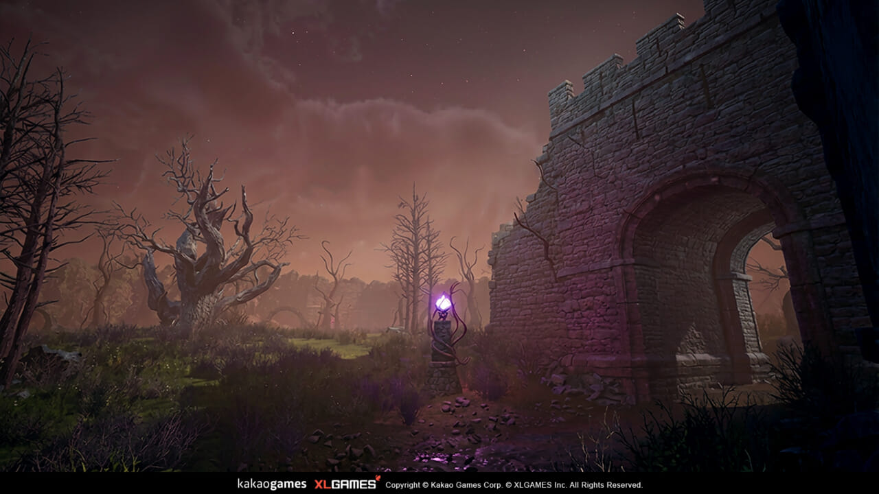 新規エリア「呪われた廃墟」の風景。荒涼とした大地に古びた石造りの遺跡が見える。